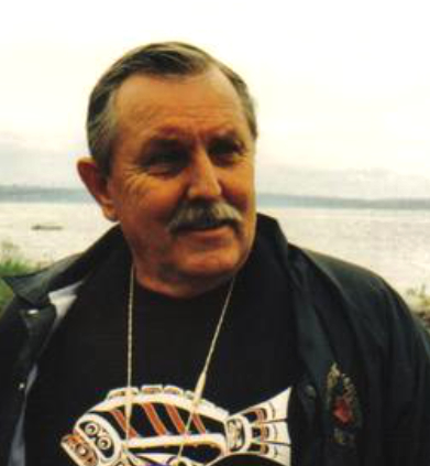 Don P smiling outdoors during a trip to Russia